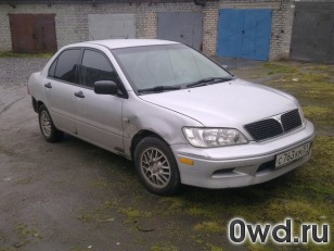 Битый автомобиль Mitsubishi Lancer Cedia